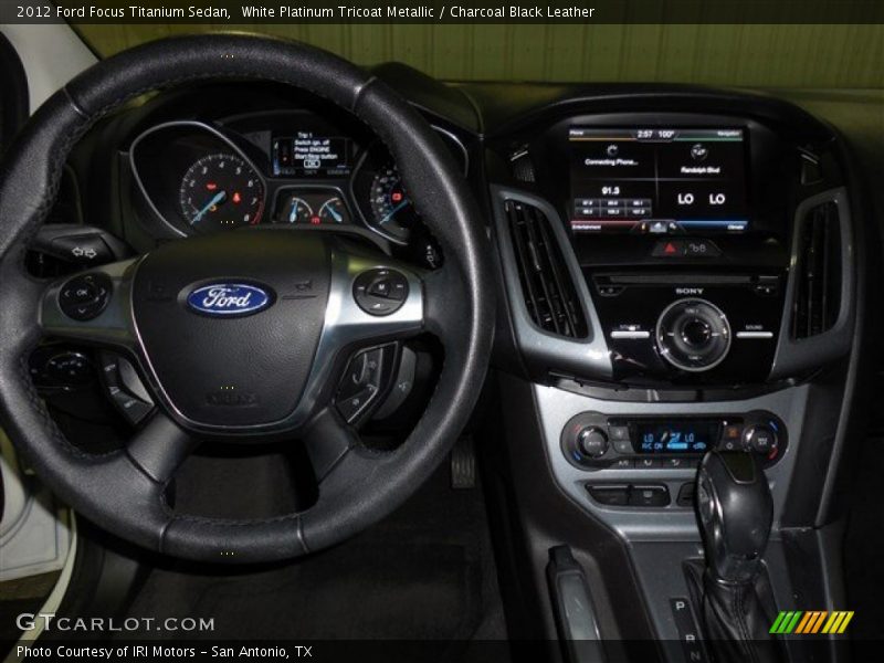 White Platinum Tricoat Metallic / Charcoal Black Leather 2012 Ford Focus Titanium Sedan