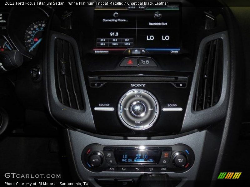 White Platinum Tricoat Metallic / Charcoal Black Leather 2012 Ford Focus Titanium Sedan