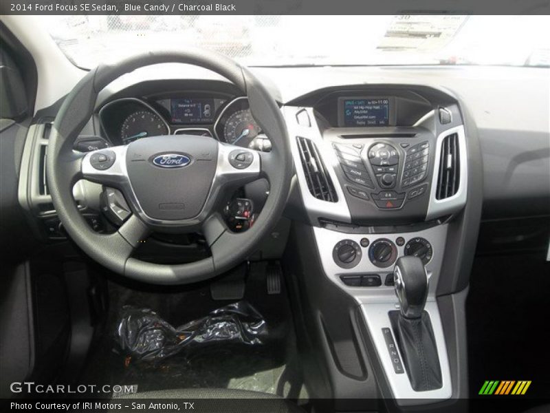 Blue Candy / Charcoal Black 2014 Ford Focus SE Sedan