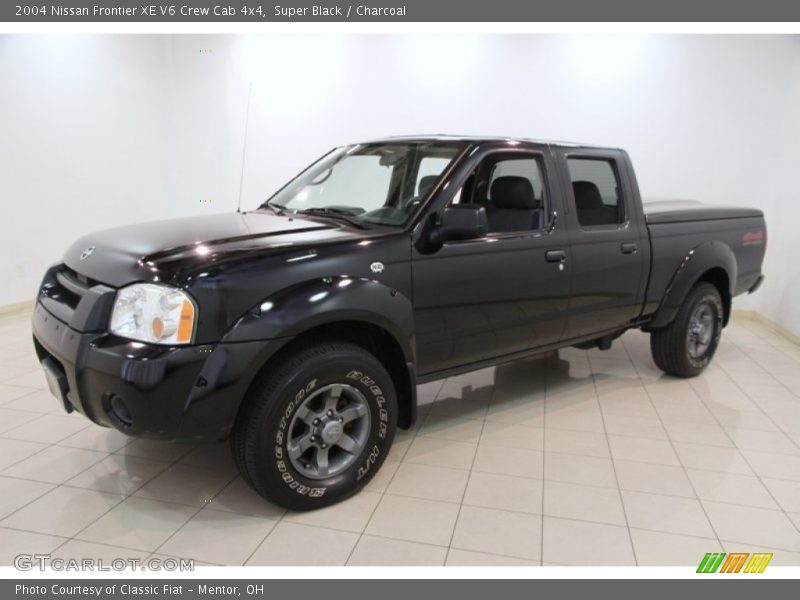 Front 3/4 View of 2004 Frontier XE V6 Crew Cab 4x4