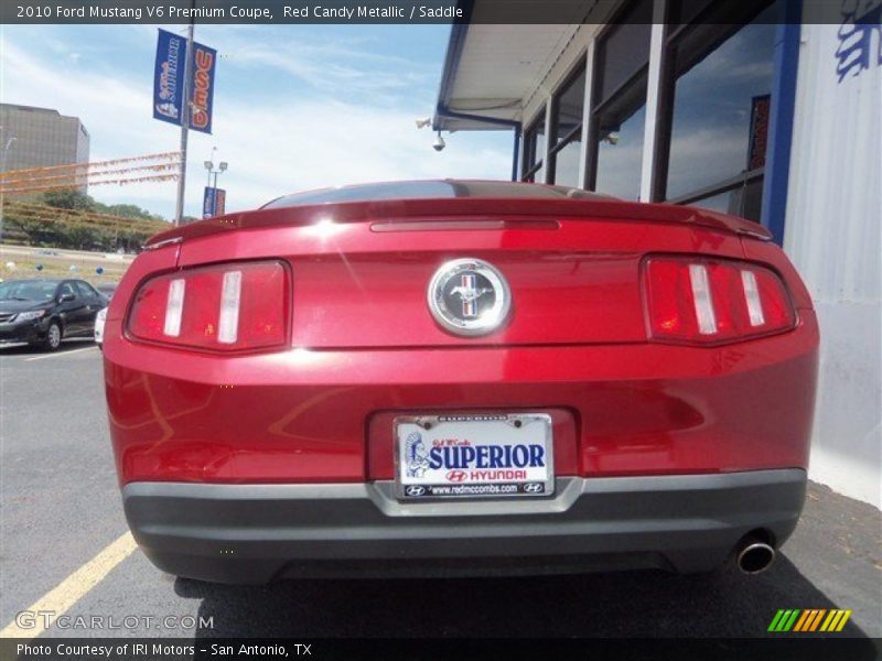 Red Candy Metallic / Saddle 2010 Ford Mustang V6 Premium Coupe