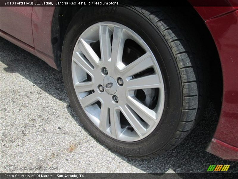 Sangria Red Metallic / Medium Stone 2010 Ford Focus SEL Sedan
