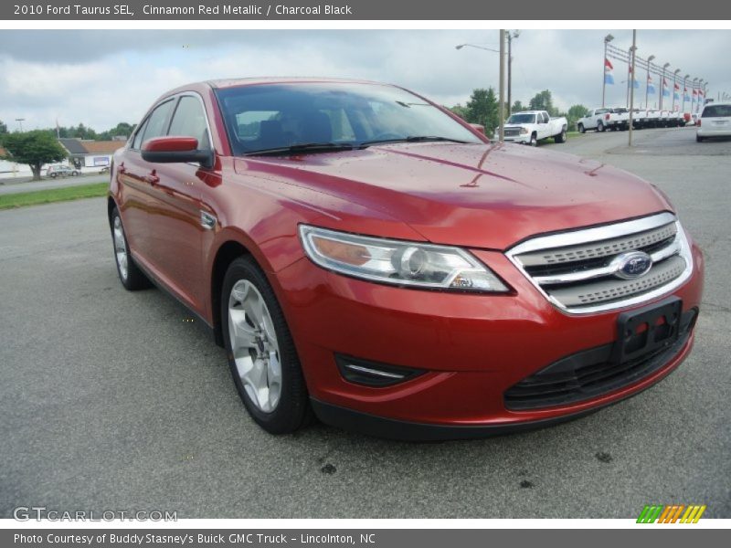 Cinnamon Red Metallic / Charcoal Black 2010 Ford Taurus SEL