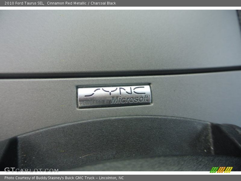 Cinnamon Red Metallic / Charcoal Black 2010 Ford Taurus SEL