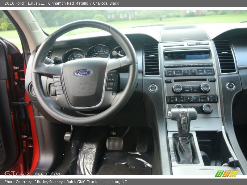 Cinnamon Red Metallic / Charcoal Black 2010 Ford Taurus SEL