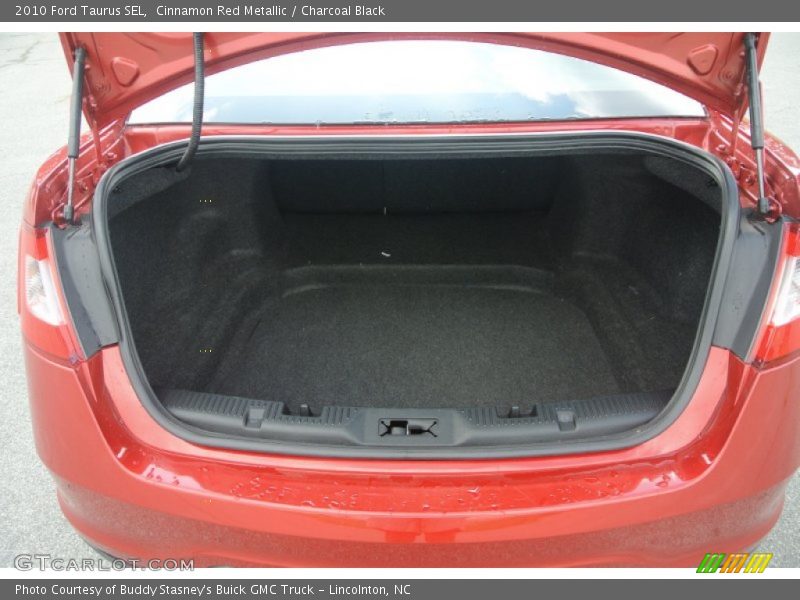 Cinnamon Red Metallic / Charcoal Black 2010 Ford Taurus SEL