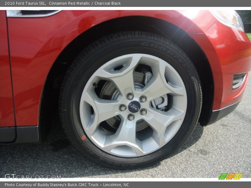 Cinnamon Red Metallic / Charcoal Black 2010 Ford Taurus SEL
