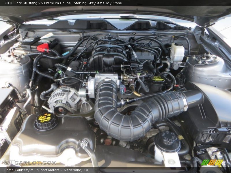Sterling Grey Metallic / Stone 2010 Ford Mustang V6 Premium Coupe