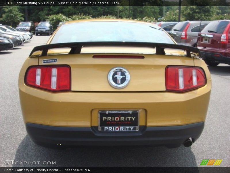 Sunset Gold Metallic / Charcoal Black 2010 Ford Mustang V6 Coupe