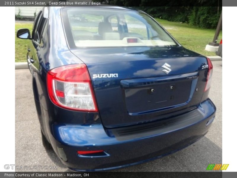 Deep Sea Blue Metallic / Beige 2011 Suzuki SX4 Sedan