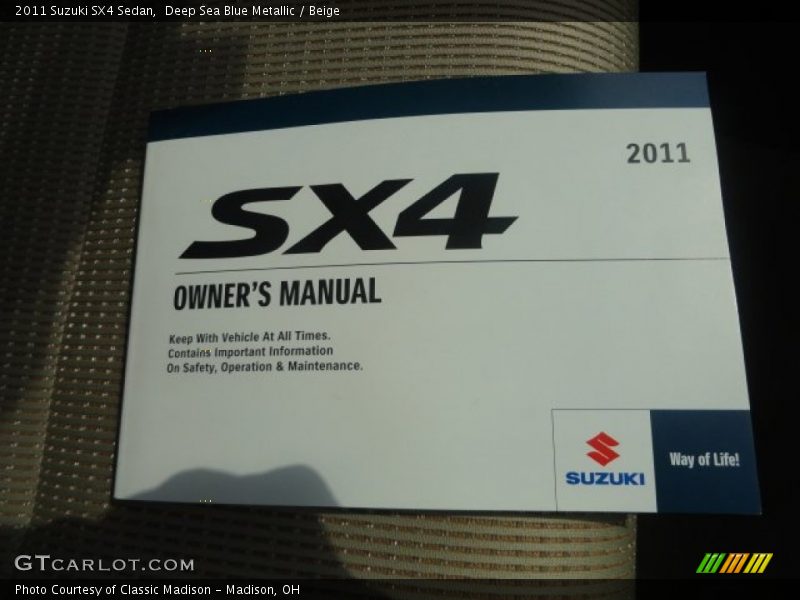 Deep Sea Blue Metallic / Beige 2011 Suzuki SX4 Sedan