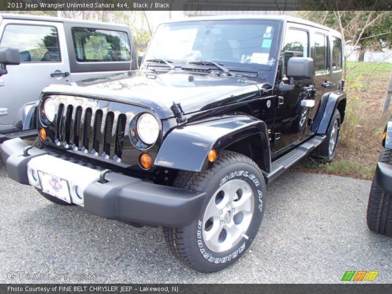 Black / Black 2013 Jeep Wrangler Unlimited Sahara 4x4