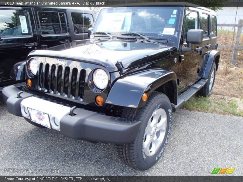 Black / Black 2013 Jeep Wrangler Unlimited Sahara 4x4