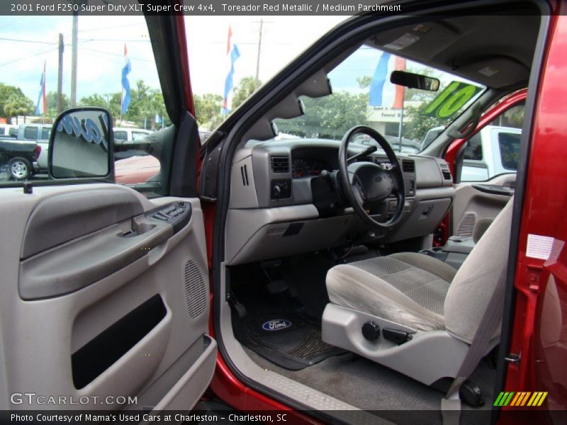 Toreador Red Metallic / Medium Parchment 2001 Ford F250 Super Duty XLT Super Crew 4x4