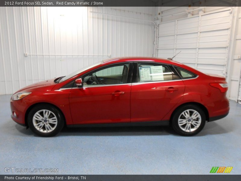Red Candy Metallic / Stone 2012 Ford Focus SEL Sedan