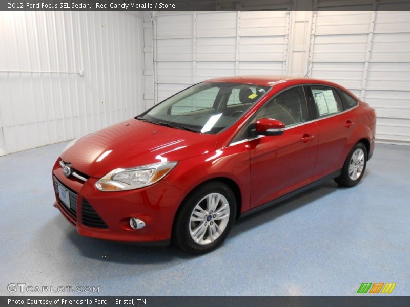 Red Candy Metallic / Stone 2012 Ford Focus SEL Sedan
