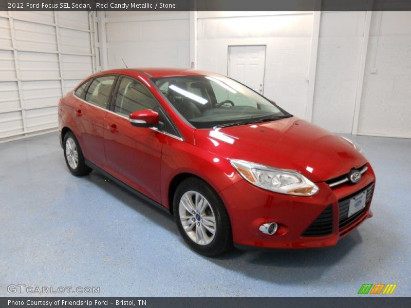 Red Candy Metallic / Stone 2012 Ford Focus SEL Sedan