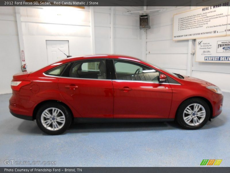 Red Candy Metallic / Stone 2012 Ford Focus SEL Sedan