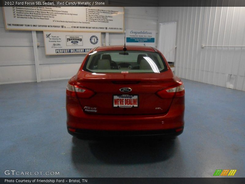 Red Candy Metallic / Stone 2012 Ford Focus SEL Sedan