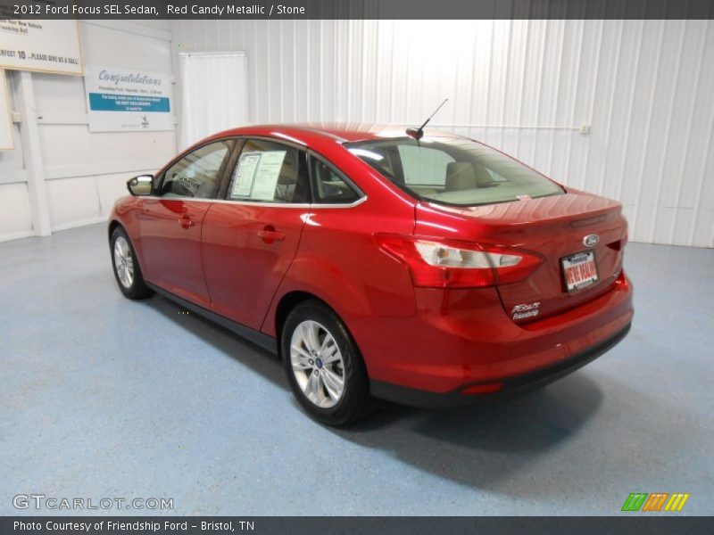 Red Candy Metallic / Stone 2012 Ford Focus SEL Sedan