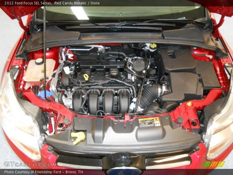 Red Candy Metallic / Stone 2012 Ford Focus SEL Sedan