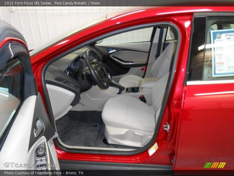 Red Candy Metallic / Stone 2012 Ford Focus SEL Sedan