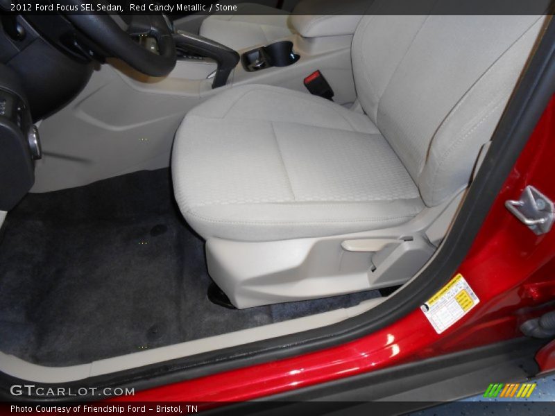 Red Candy Metallic / Stone 2012 Ford Focus SEL Sedan