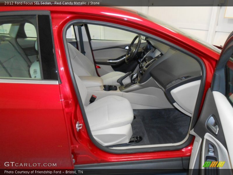 Red Candy Metallic / Stone 2012 Ford Focus SEL Sedan