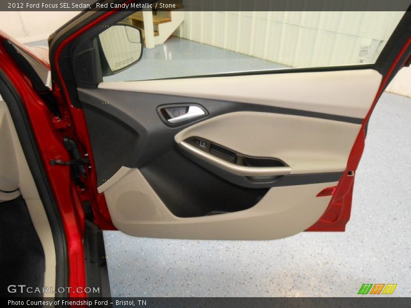 Red Candy Metallic / Stone 2012 Ford Focus SEL Sedan