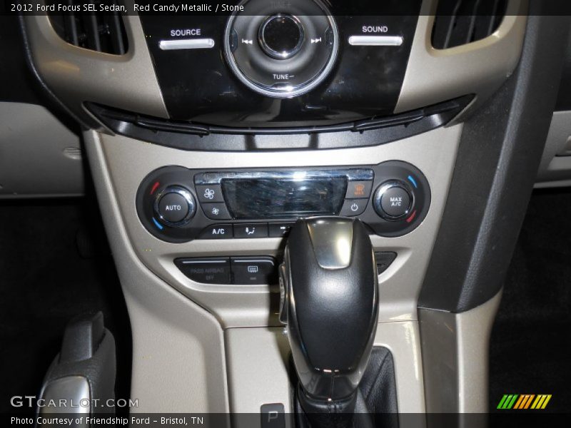 Red Candy Metallic / Stone 2012 Ford Focus SEL Sedan
