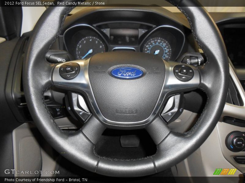 Red Candy Metallic / Stone 2012 Ford Focus SEL Sedan