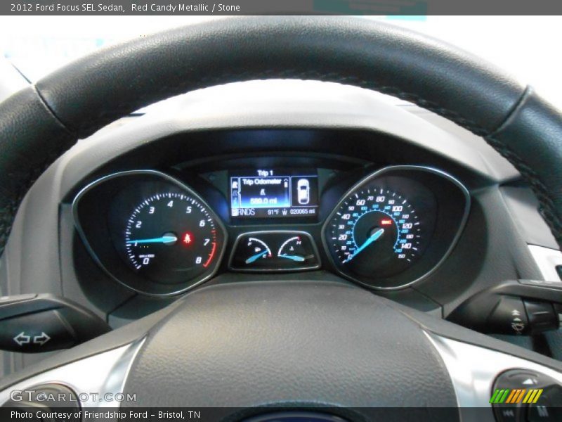 Red Candy Metallic / Stone 2012 Ford Focus SEL Sedan