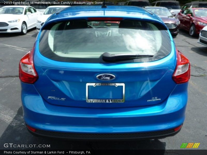 Blue Candy / Medium Light Stone 2013 Ford Focus SE Hatchback