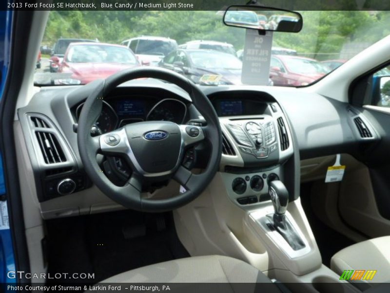 Blue Candy / Medium Light Stone 2013 Ford Focus SE Hatchback