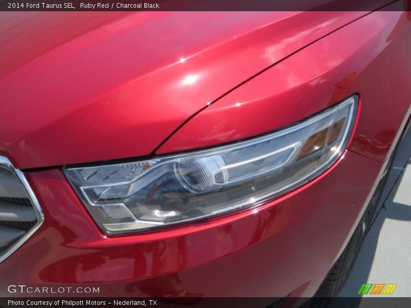 Ruby Red / Charcoal Black 2014 Ford Taurus SEL
