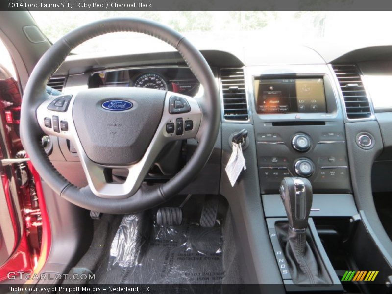 Ruby Red / Charcoal Black 2014 Ford Taurus SEL