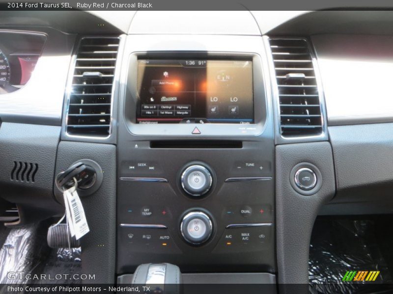 Ruby Red / Charcoal Black 2014 Ford Taurus SEL