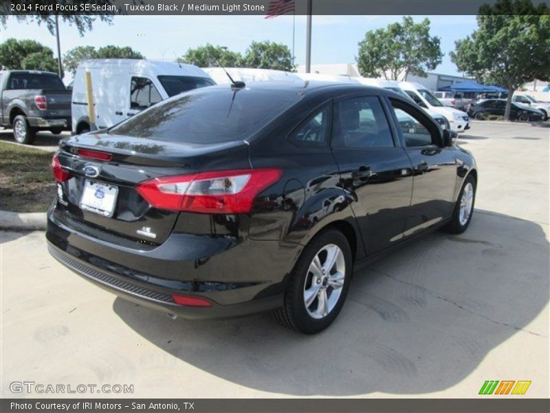 Tuxedo Black / Medium Light Stone 2014 Ford Focus SE Sedan