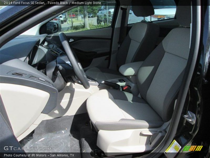 Tuxedo Black / Medium Light Stone 2014 Ford Focus SE Sedan