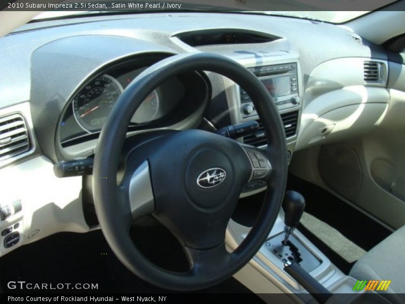 Satin White Pearl / Ivory 2010 Subaru Impreza 2.5i Sedan