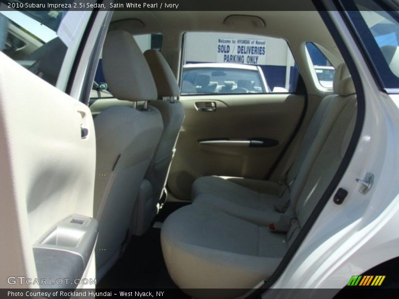 Satin White Pearl / Ivory 2010 Subaru Impreza 2.5i Sedan
