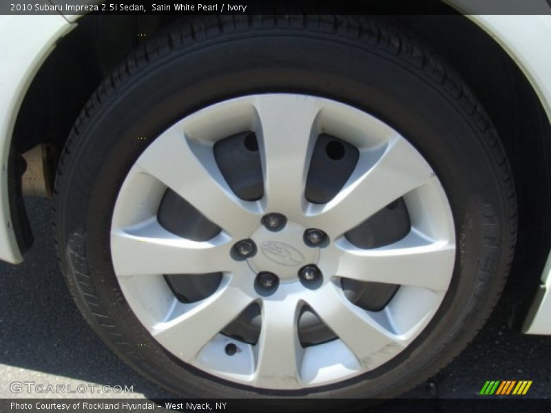 Satin White Pearl / Ivory 2010 Subaru Impreza 2.5i Sedan