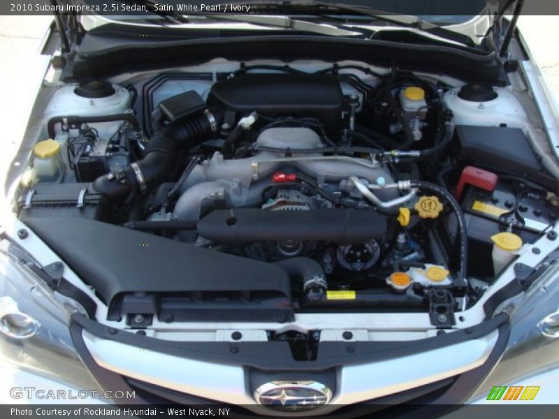 Satin White Pearl / Ivory 2010 Subaru Impreza 2.5i Sedan