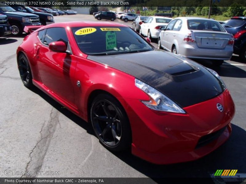 Solid Red / NISMO Black/Red Cloth 2010 Nissan 370Z NISMO Coupe