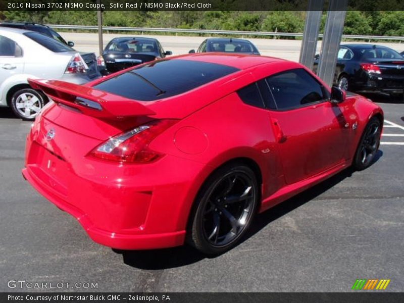 Solid Red / NISMO Black/Red Cloth 2010 Nissan 370Z NISMO Coupe