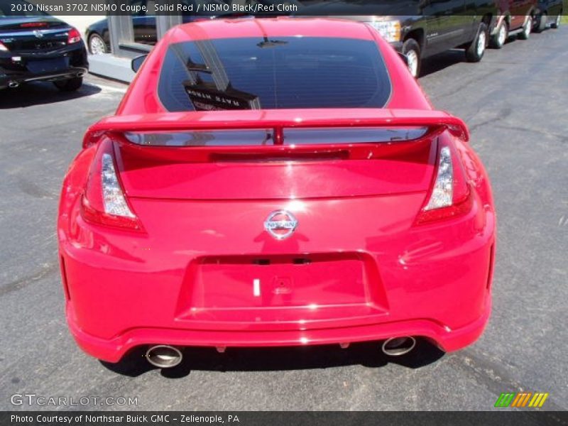 Solid Red / NISMO Black/Red Cloth 2010 Nissan 370Z NISMO Coupe