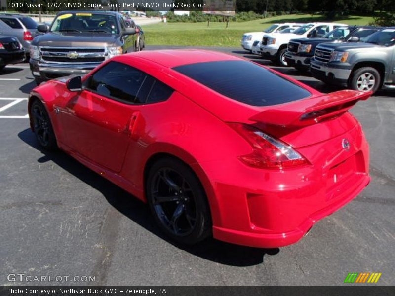 Solid Red / NISMO Black/Red Cloth 2010 Nissan 370Z NISMO Coupe