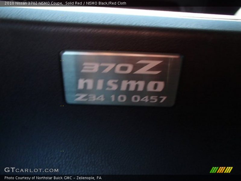 Solid Red / NISMO Black/Red Cloth 2010 Nissan 370Z NISMO Coupe