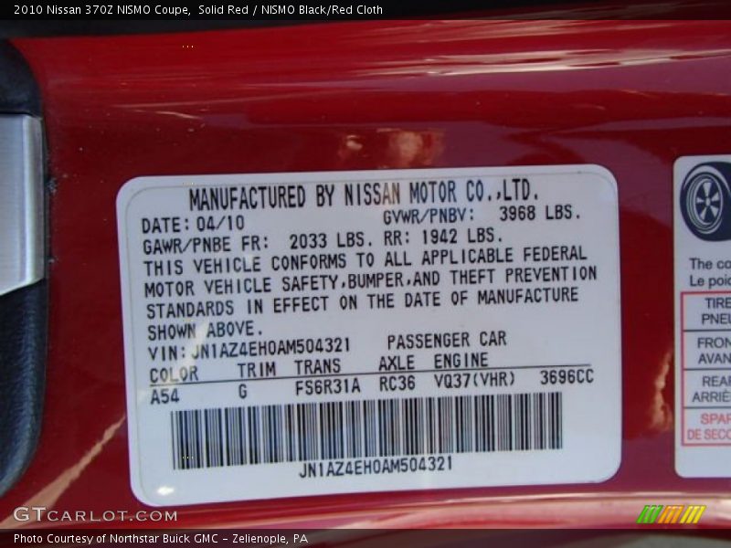 Solid Red / NISMO Black/Red Cloth 2010 Nissan 370Z NISMO Coupe