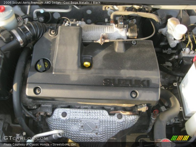 Cool Beige Metallic / Black 2006 Suzuki Aerio Premium AWD Sedan